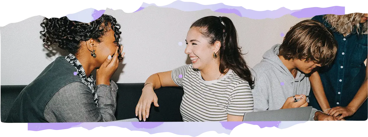 Stylized photo of two students talking and laughing