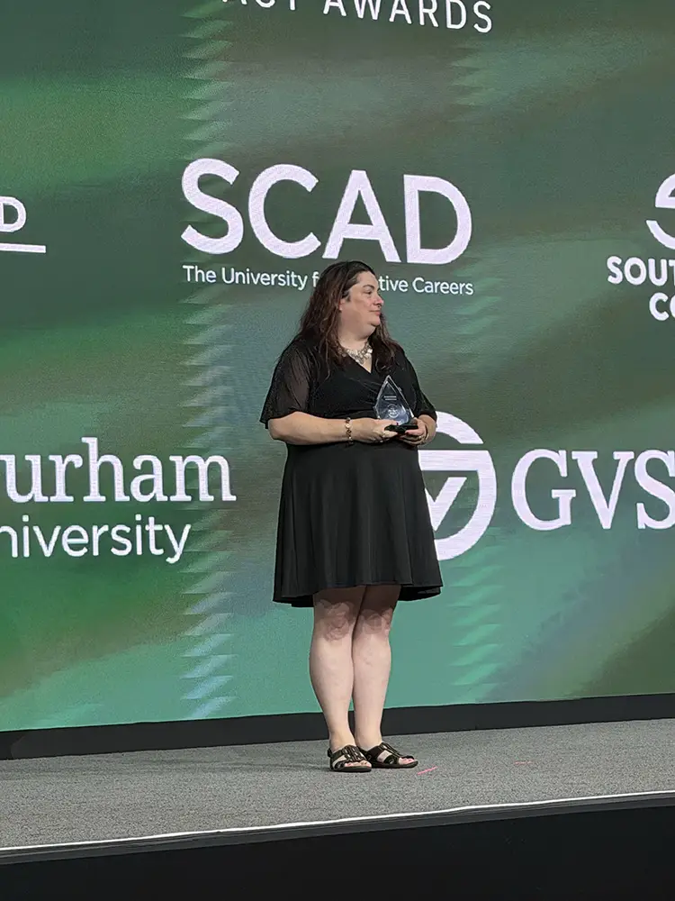 Bevin Rainwater accepting her Catalyst Award at Building Blackboard Together