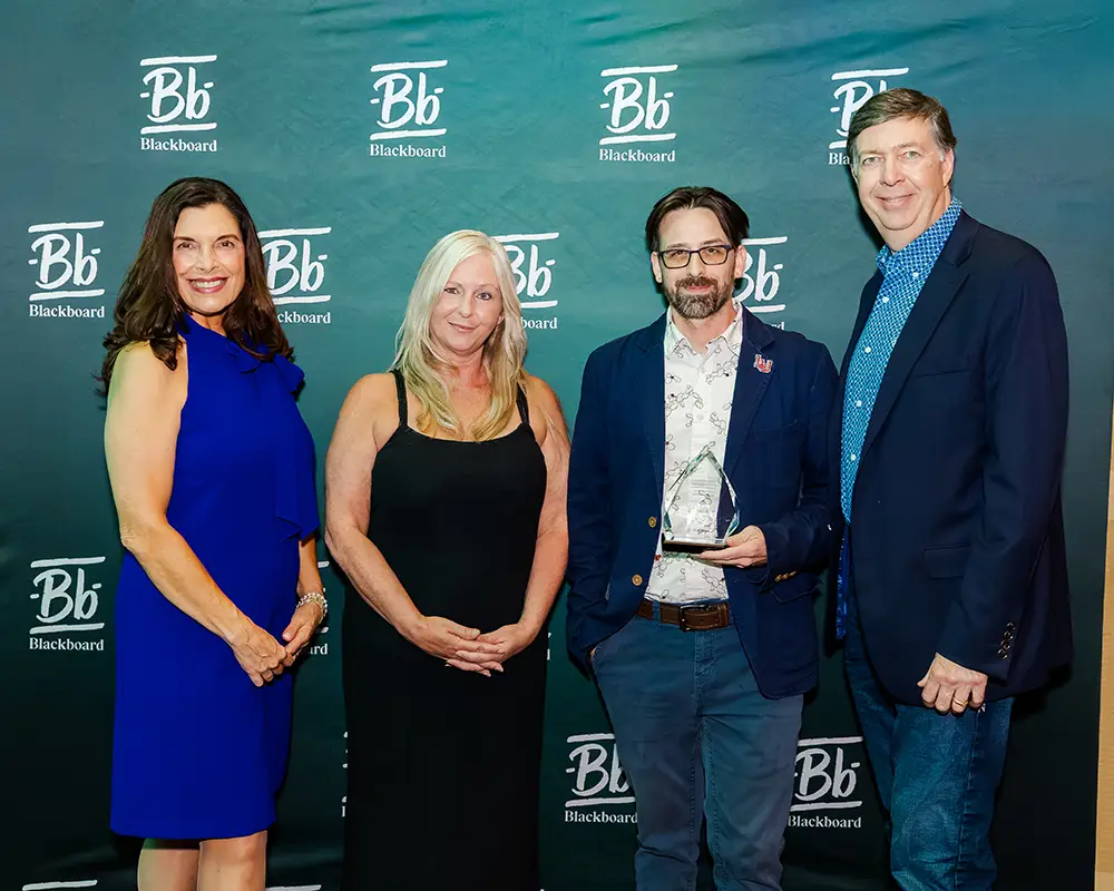 Representatives from Lamar University accepting their Catalyst Award at Building Blackboard Together