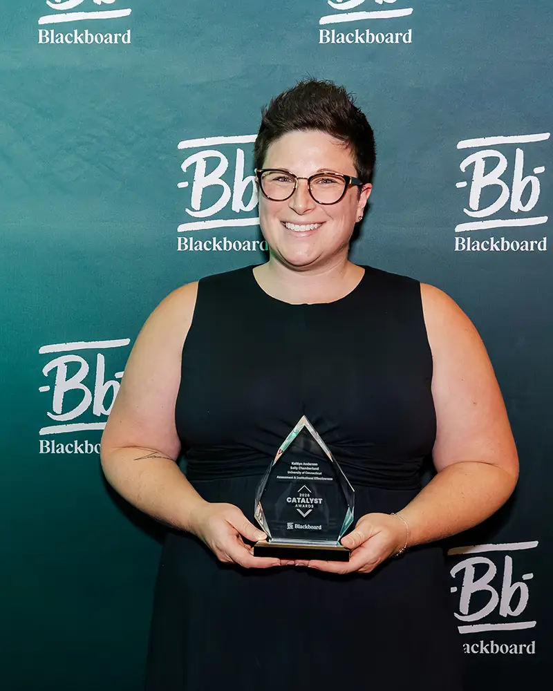 Representative from the University of Connecticut accepting their Catalyst Award at Building Blackboard Together